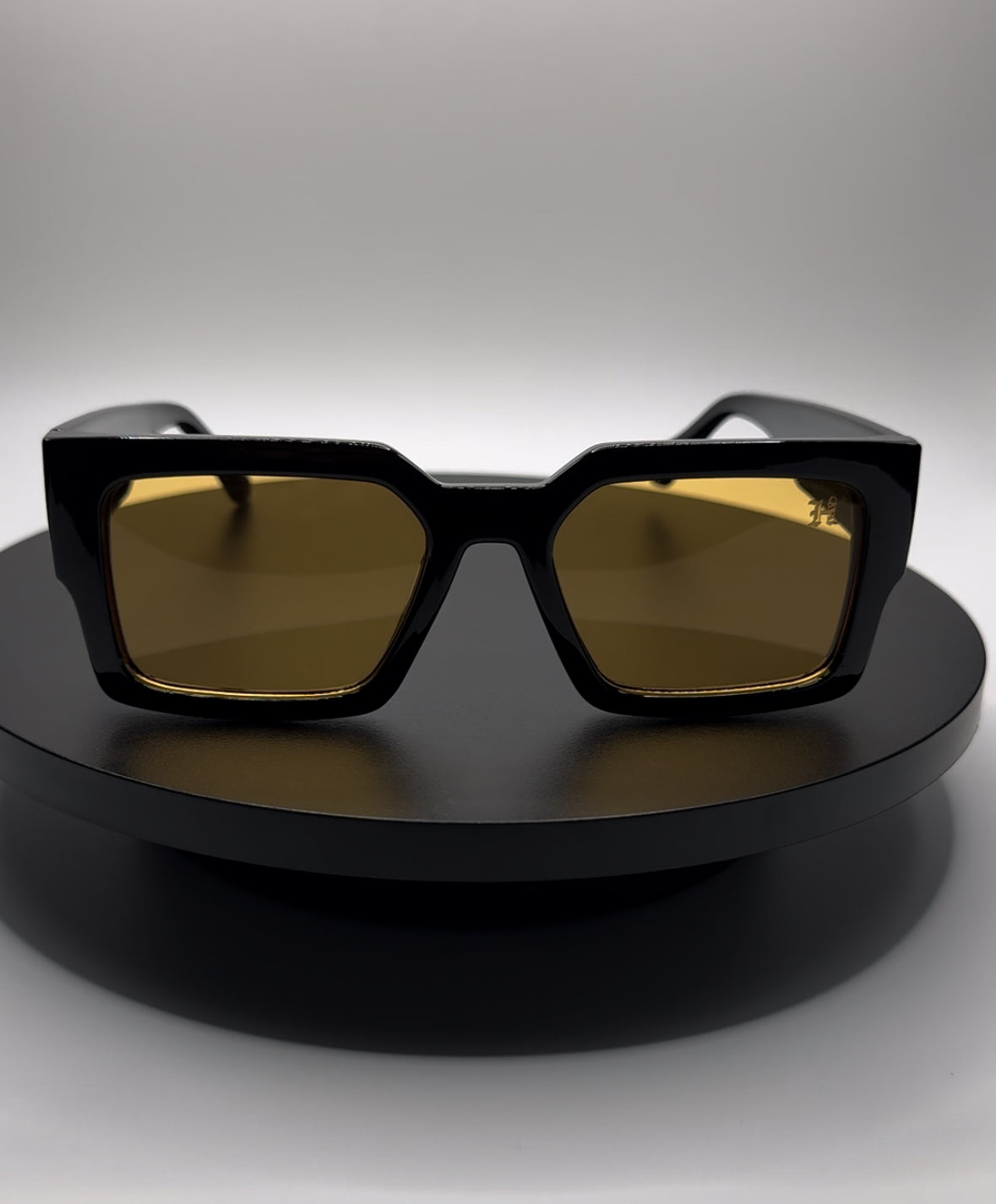 HERMS BLACK FRAME YELLOW TINT SHADE SUNGLASSES