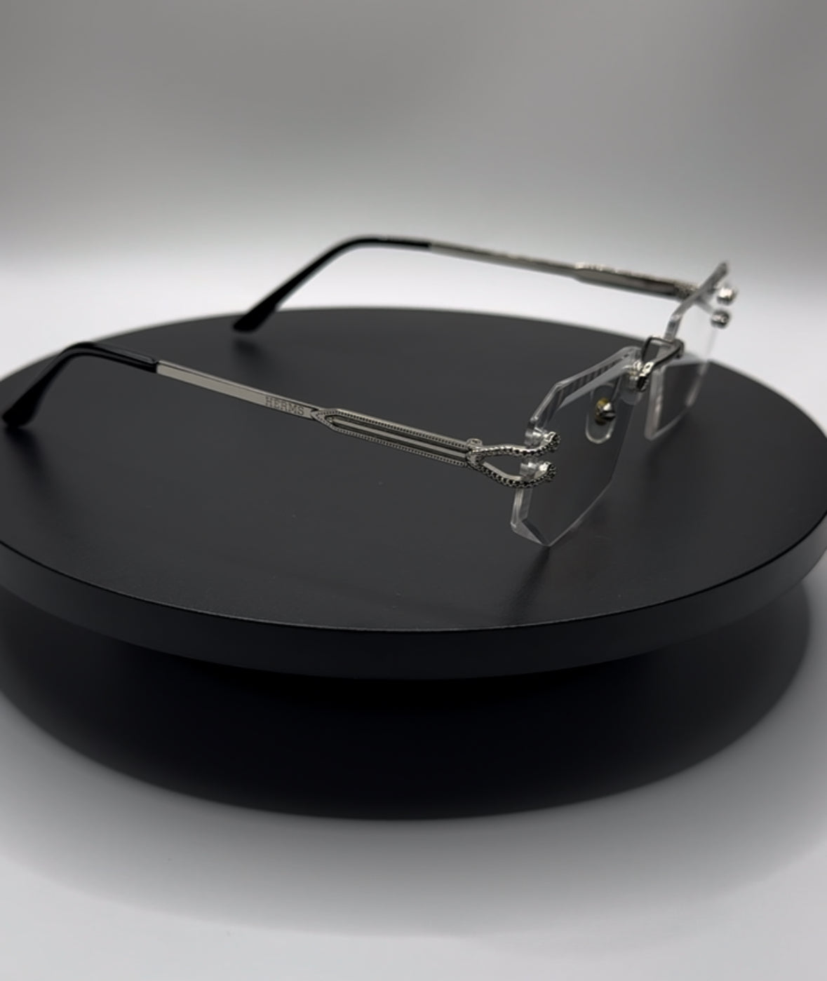 HERMS SILVER FRAME GLASSES
