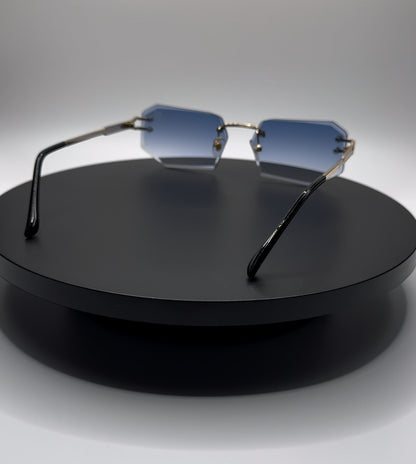 HERMS GOLD FRAME BLUE TINT LENSE